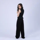 Vesta cu revere si peplum la spate, din stofa neagra